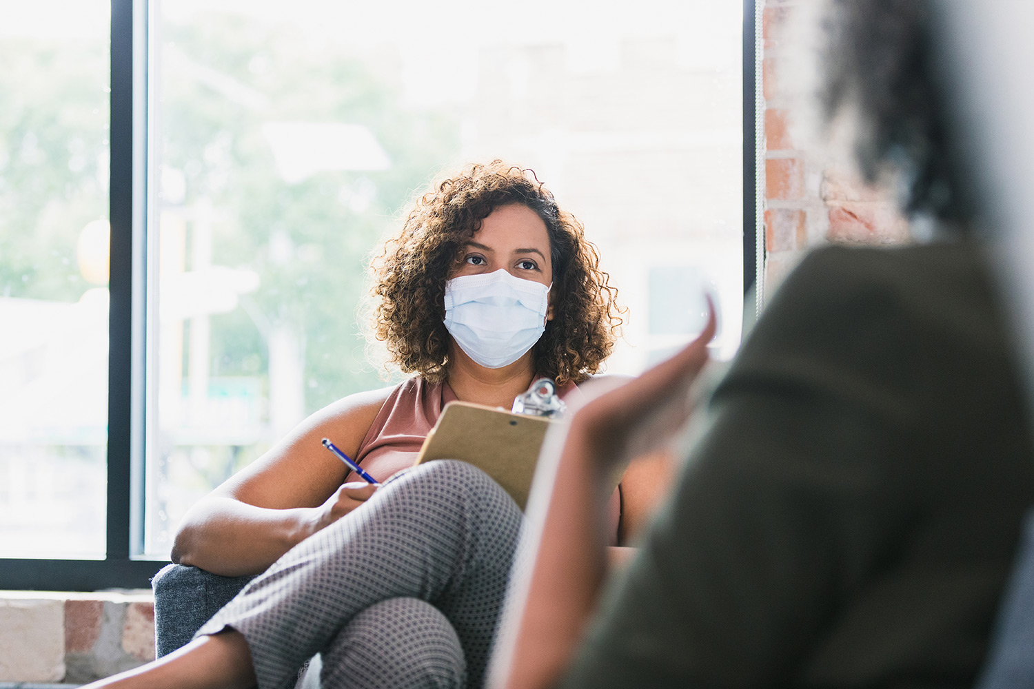 Patient talking with medical staff